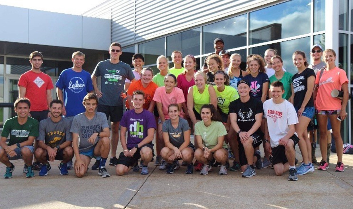 Cross Country runners pose in front of recreation center before first practice of the season.